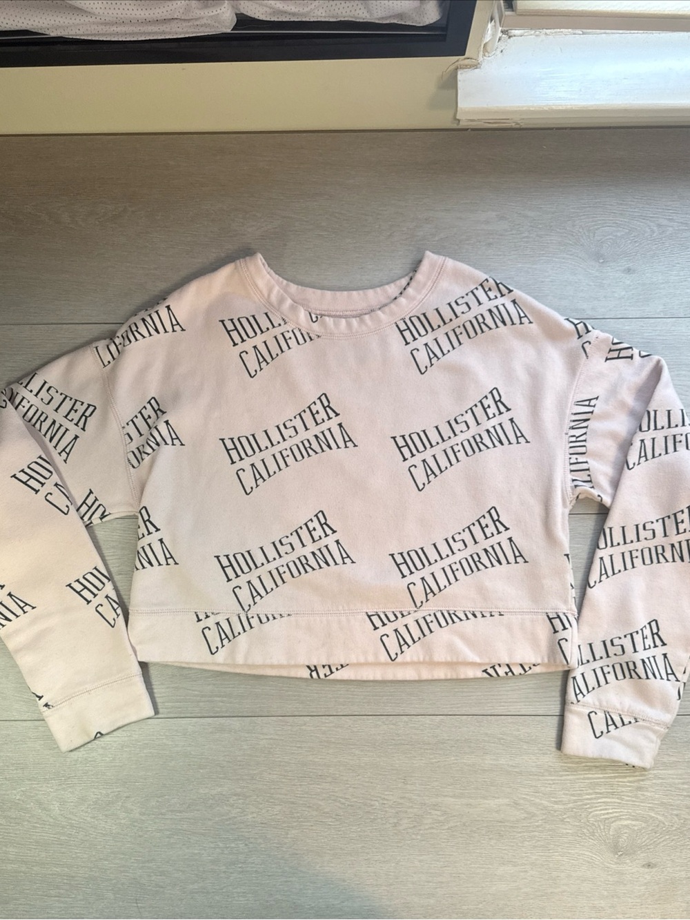 Hollister Light Pink All-Over Logo Cropped Crewneck